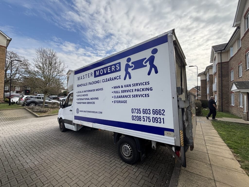 Master Movers team loading a van for house removals in London