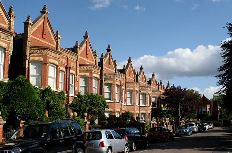 Barnes riverside in South West London with traditional houses, leafy streets, and views along the River Thames near Barnes Bridge