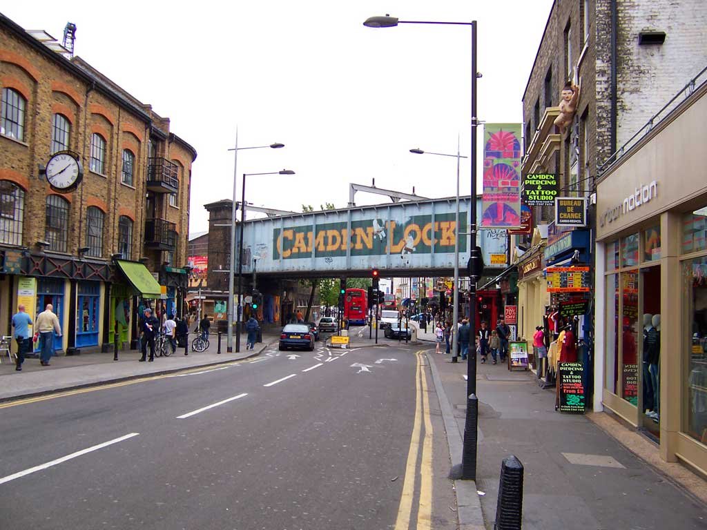 Camden Town high street area with busy shops, flats and urban North London surroundings