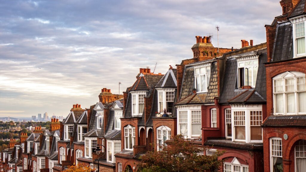 North London residential street with terraced houses, parked cars and typical urban neighbourhood setting
