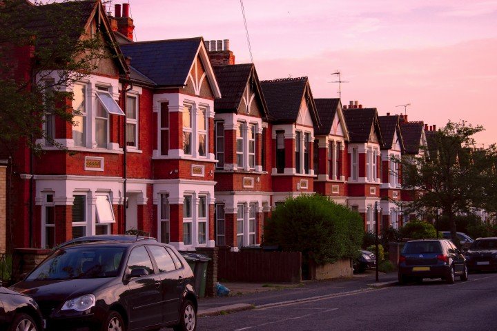 South London residential street with Victorian terraced houses, parked cars and typical urban neighbourhood surroundings